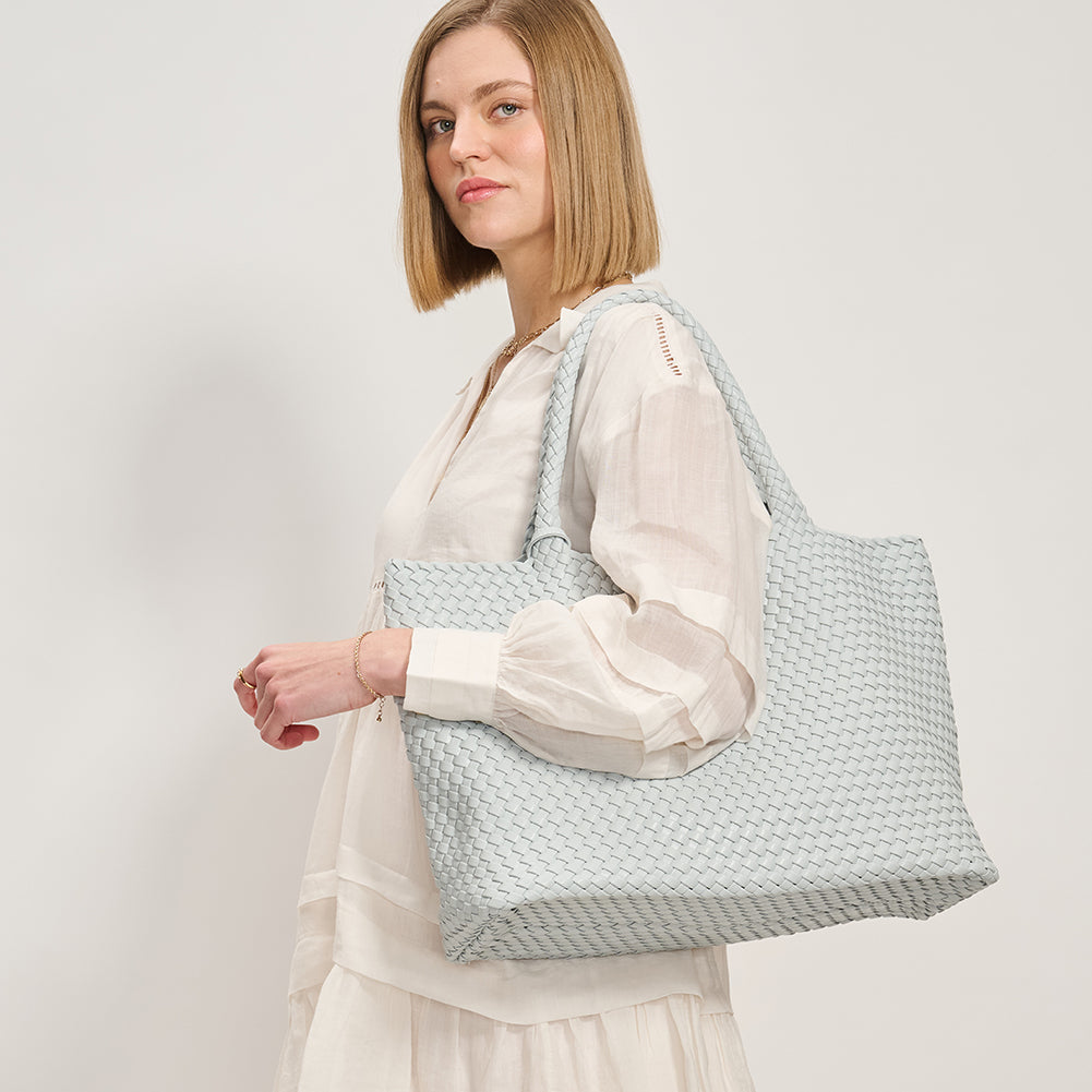 Woman wearing Moda Luxe Solana Tote 842017135760 View 3 | Ice Blue