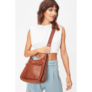 Woman wearing Cognac Moda Luxe Azalea Crossbody 842017128021 View 2 | Cognac