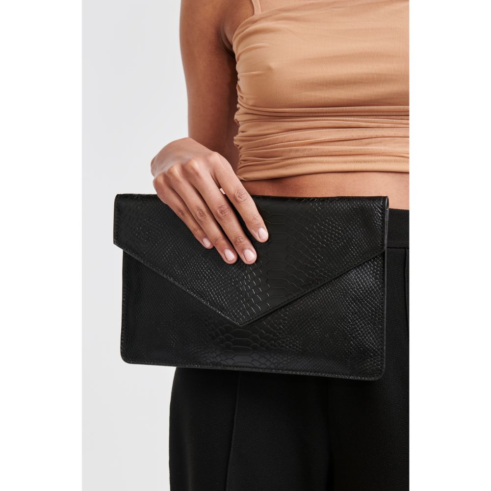 Woman wearing Black Moda Luxe Romy Clutch 842017118145 View 1 | Black