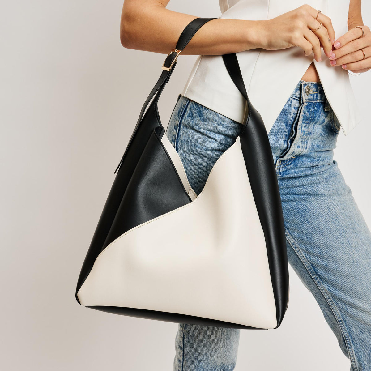 Woman wearing Ivory Black Moda Luxe Frankie Hobo 842017138518 View 1 | Ivory Black