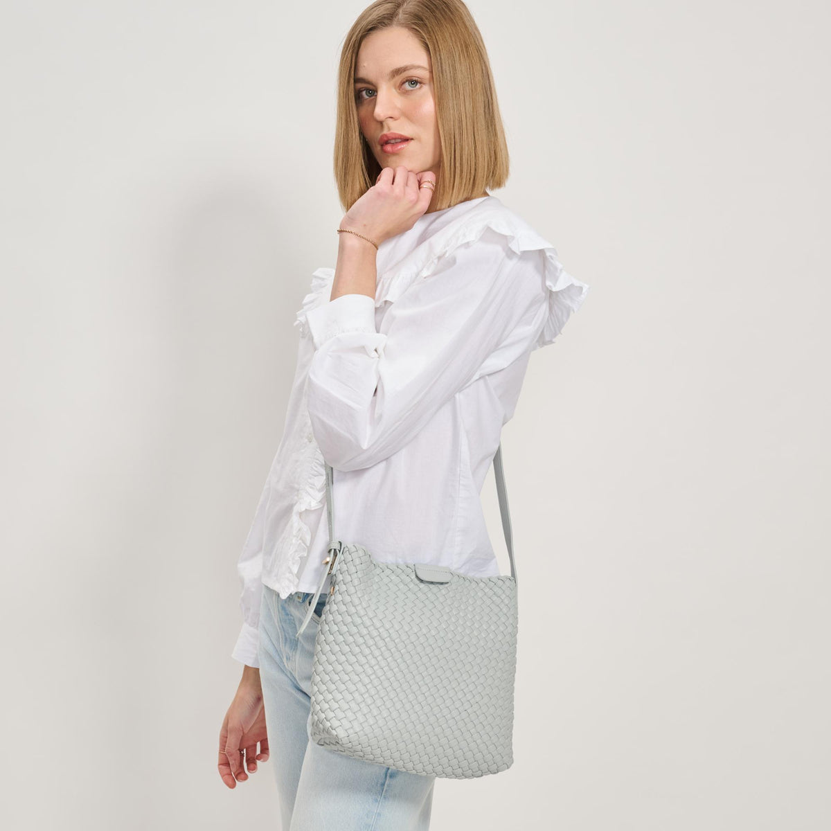 Woman wearing Ice Blue Moda Luxe Isadora Bucket 842017137344 View 2 | Ice Blue