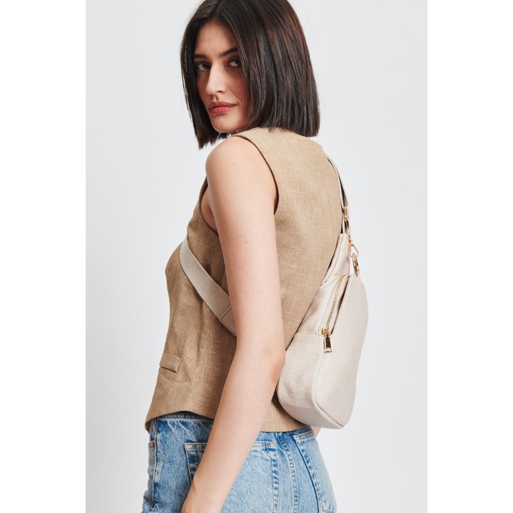 Woman wearing Bone Moda Luxe Regina - Coated Canvas Sling Backpack 842017132615 View 2 | Bone