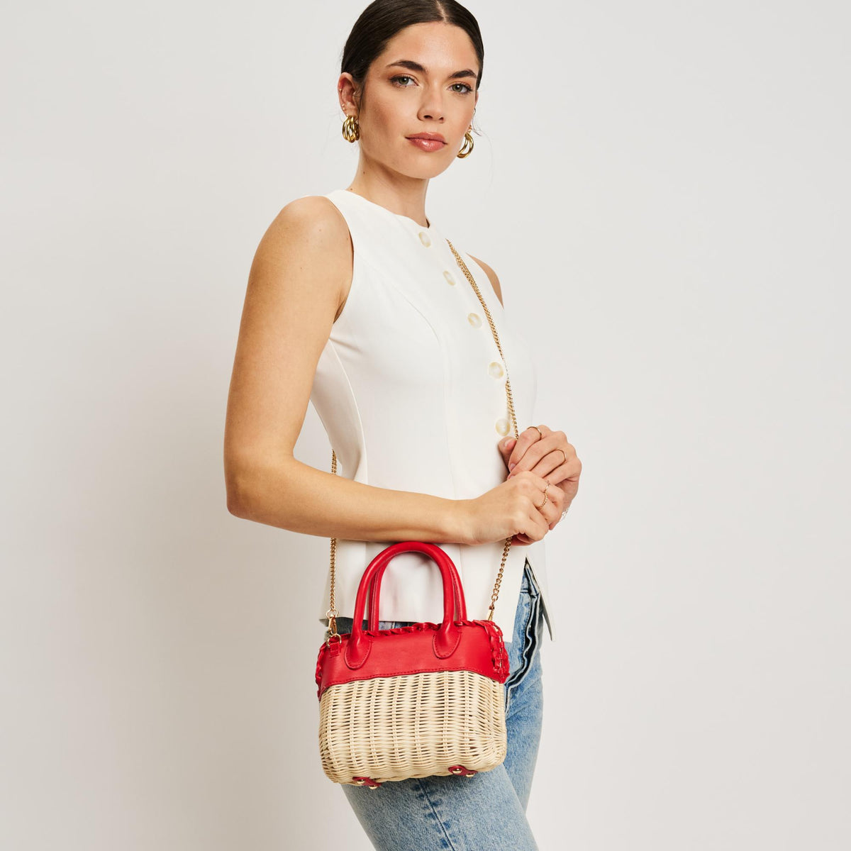 Woman wearing Red Moda Luxe Maya Crossbody 842017138327 View 2 | Red