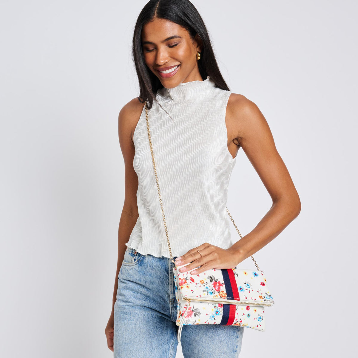 Woman wearing White Moda Luxe Jules Print Clutch 842017119401 View 3 | White