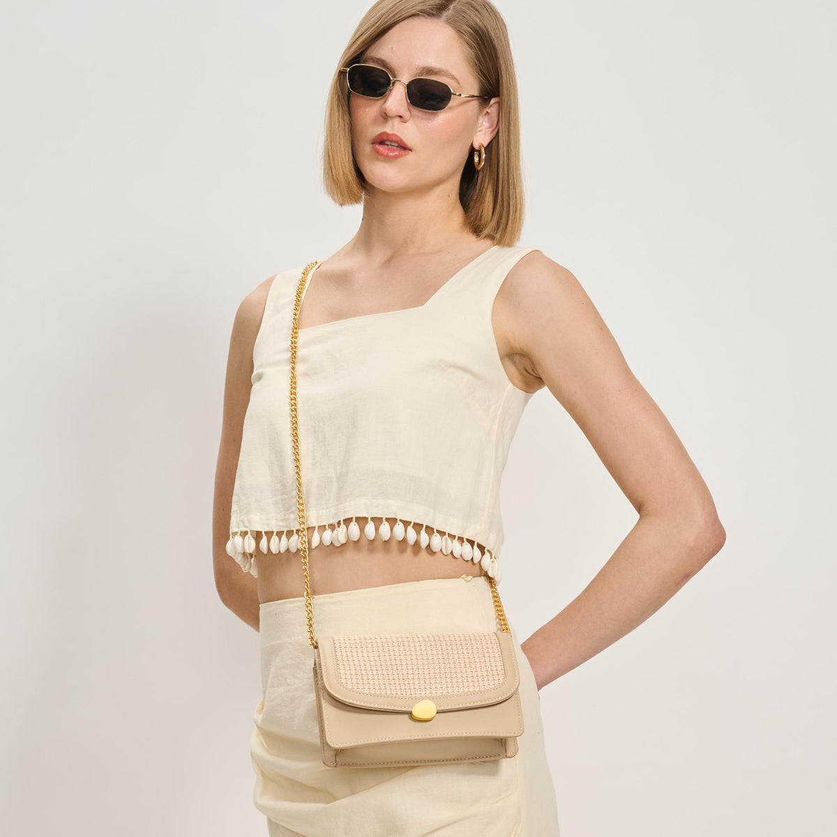 Woman wearing Cream Moda Luxe Nina Crossbody 842017137207 View 1 | Cream