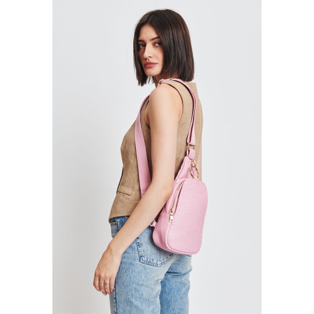 Woman wearing Bubblegum Moda Luxe Regina - Coated Canvas Sling Backpack 842017132639 View 2 | Bubblegum