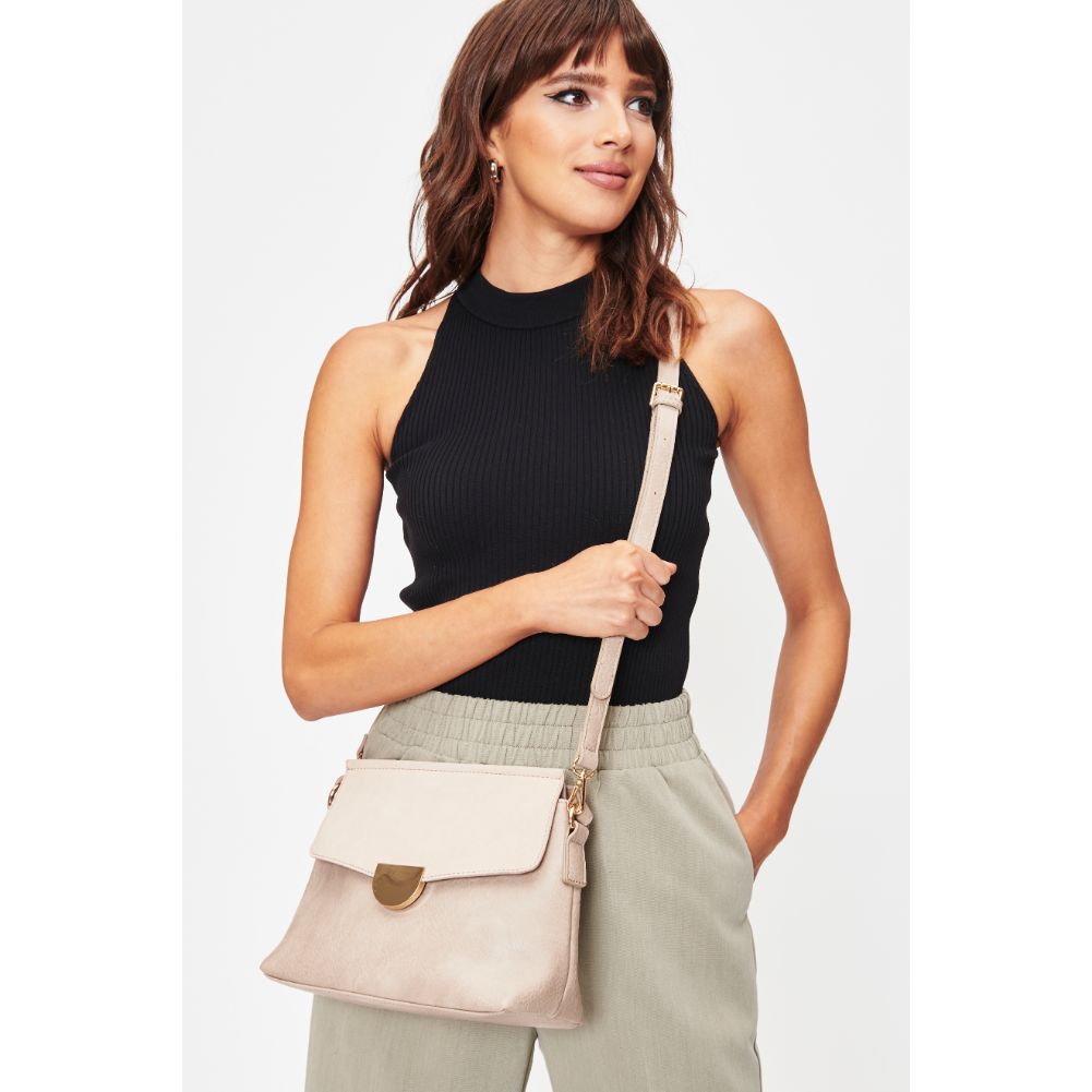 Woman wearing Nude Moda Luxe Abby Crossbody 842017128649 View 2 | Nude