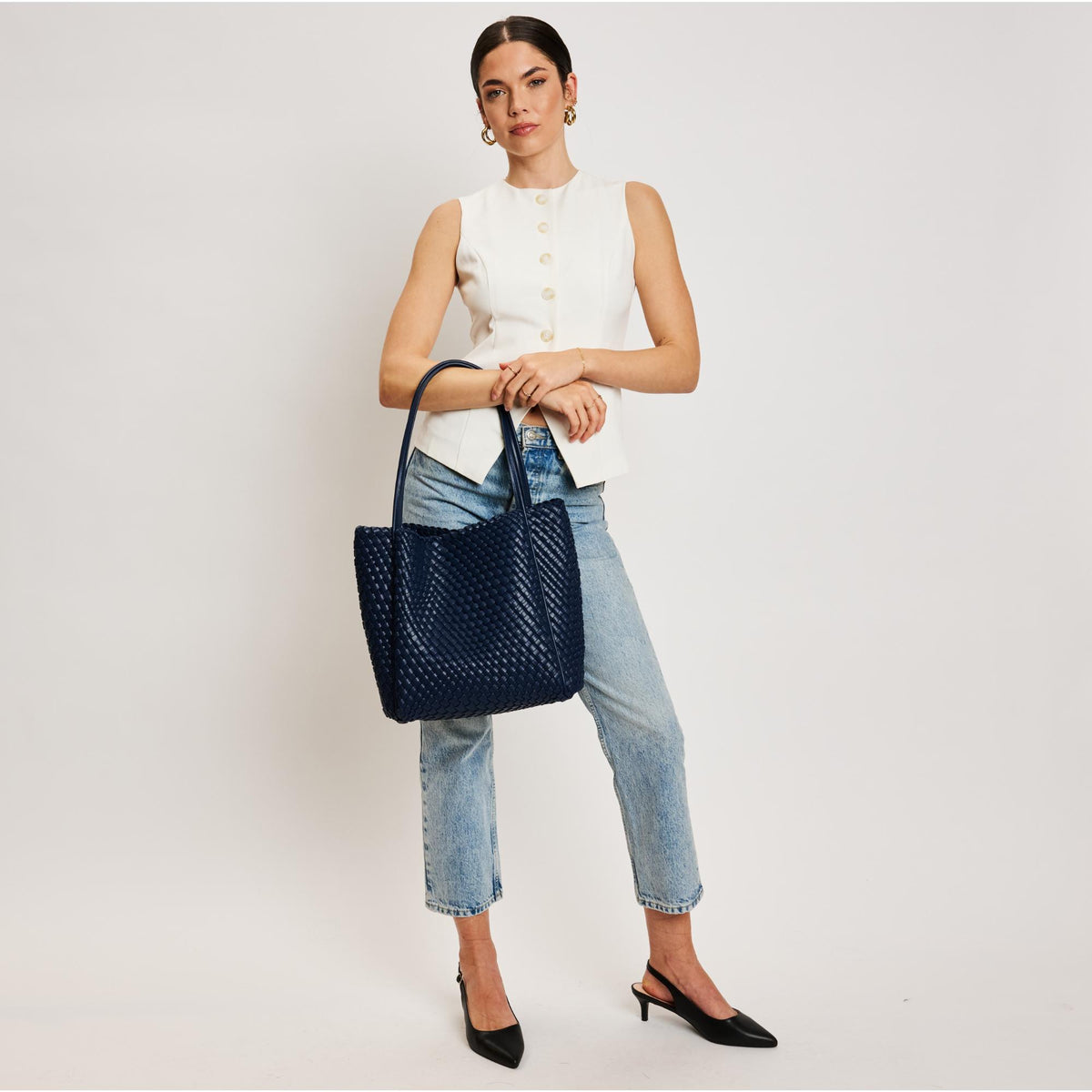 Woman wearing Navy Moda Luxe Gladys Tote 842017137276 View 3 | Navy