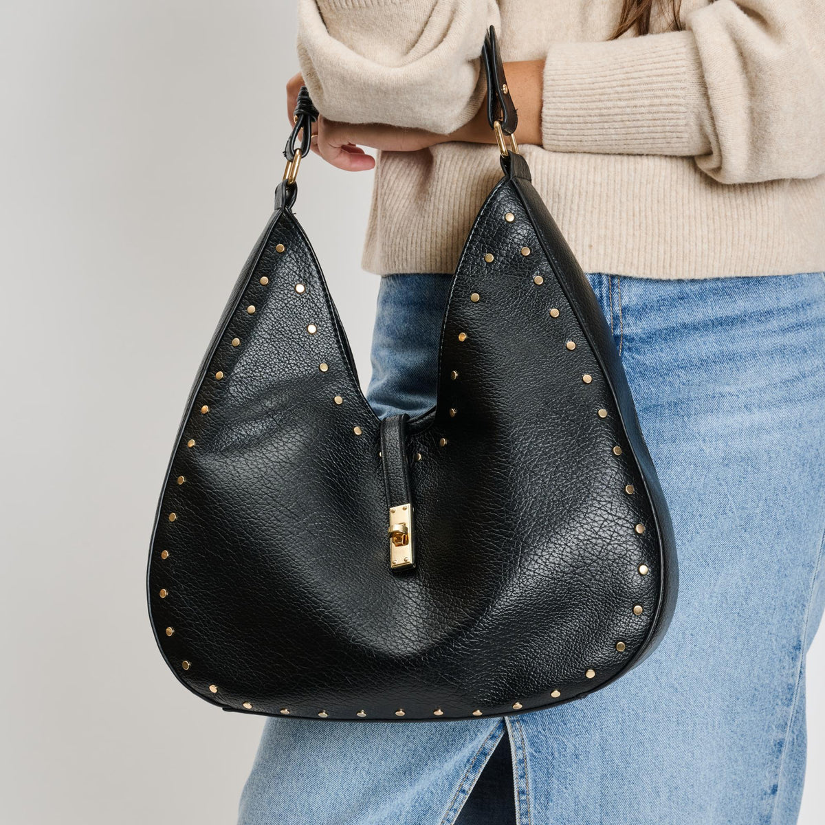 Woman wearing Black Moda Luxe Olivia Hobo 842017136125 View 1 | Black