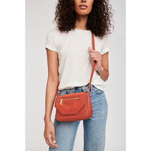 Woman wearing Rust Moda Luxe Hallie Crossbody 842017120537 View 1 | Rust