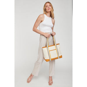 Woman wearing Tan Moda Luxe Candace Tote 842017127666 View 3 | Tan