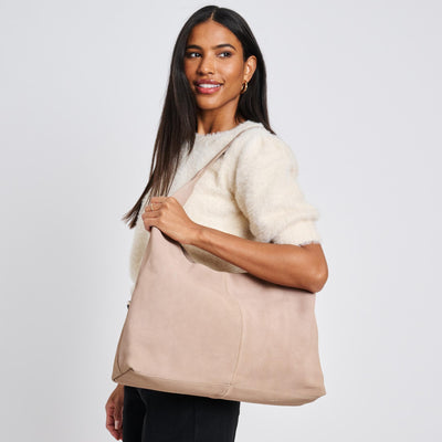 Woman wearing Natural Moda Luxe Amber Hobo 842017137047 View 1 | Natural