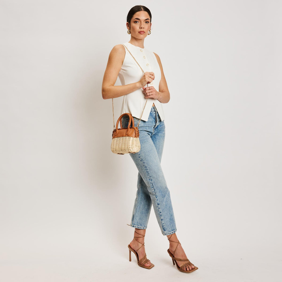 Woman wearing Tan Moda Luxe Maya Crossbody 842017138310 View 3 | Tan