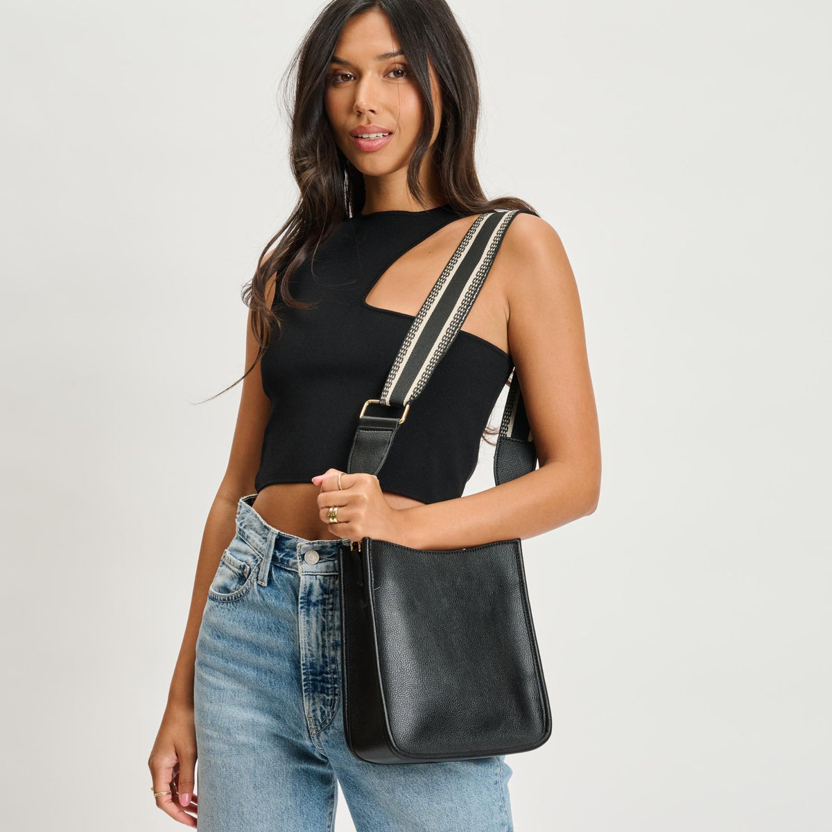 Woman wearing Black Moda Luxe Glitzia Crossbody 842017135135 View 1 | Black