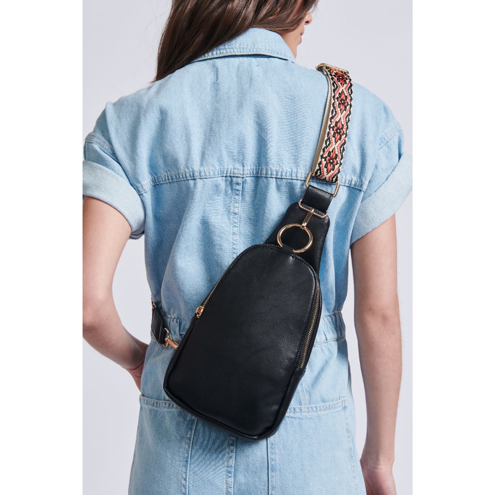Woman wearing Black Moda Luxe Regina Sling Backpack 842017129523 View 2 | Black