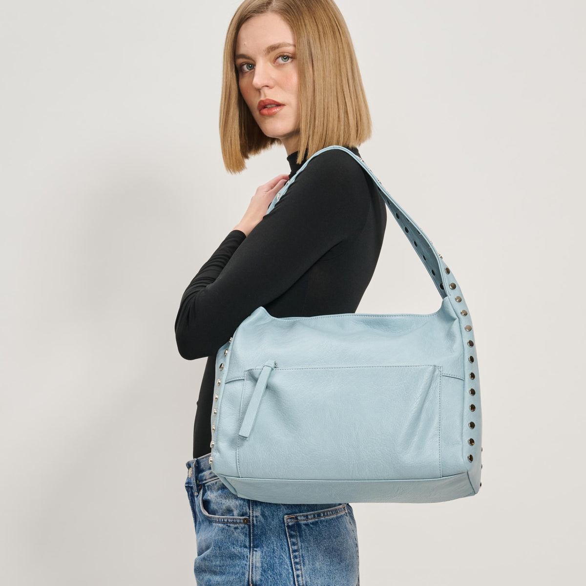 Woman wearing Ice Blue Moda Luxe Misty Hobo 842017137207 View 1 | Ice Blue