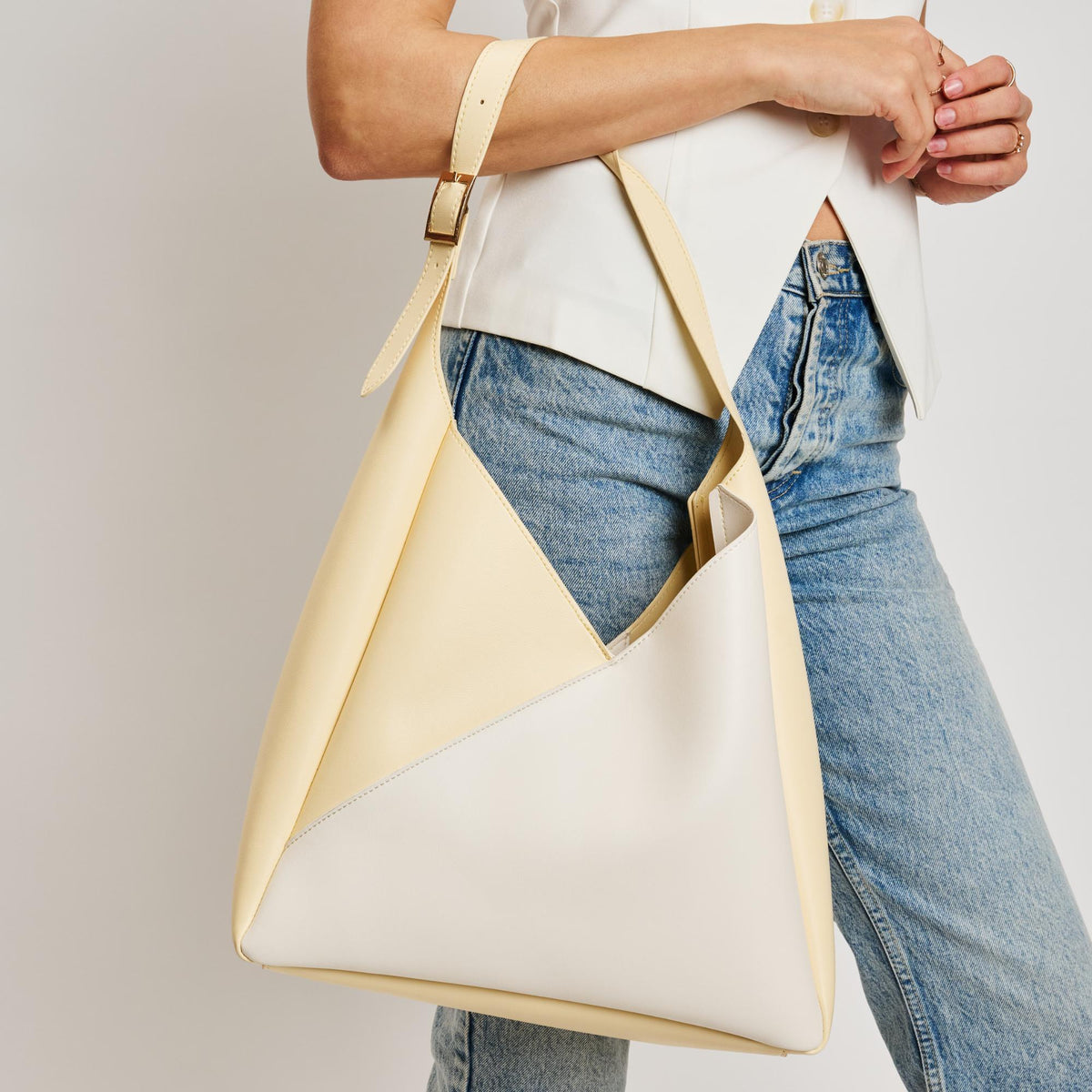 Woman wearing Ivory Butter Moda Luxe Frankie Hobo 842017138549 View 1 | Ivory Butter