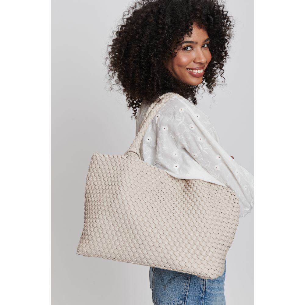 Woman wearing Ivory Moda Luxe Solana Tote 842017132158 View 1 | Ivory