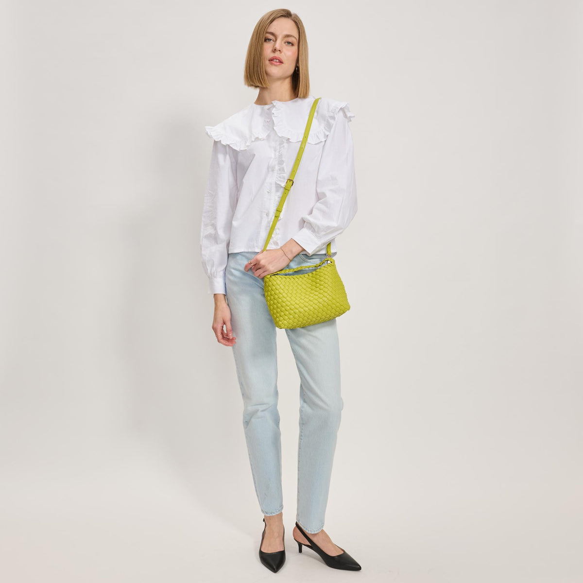 Woman wearing Lemon Moda Luxe Kaia Crossbody 842017137412 View 2 | Lemon