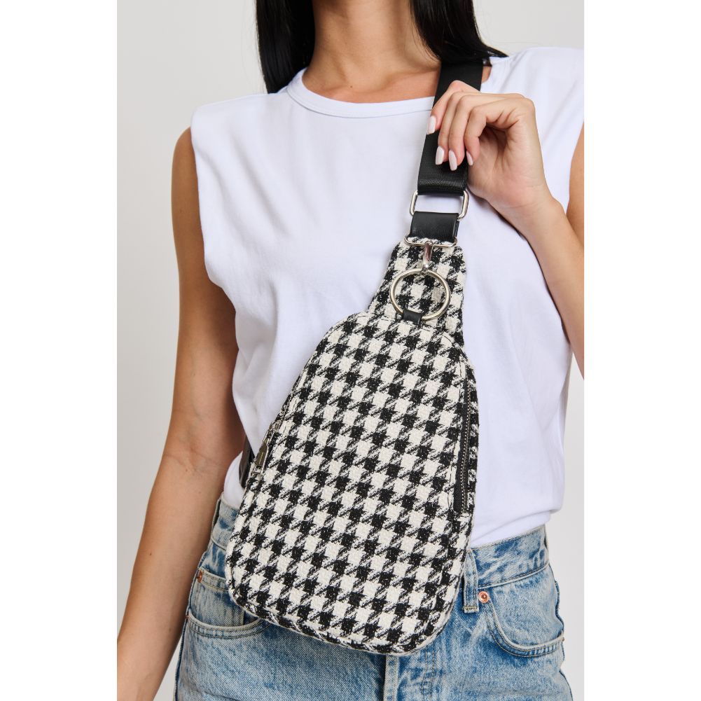 Woman wearing Black White Moda Luxe Regina Sling Backpack 842017133384 View 1 | Black White