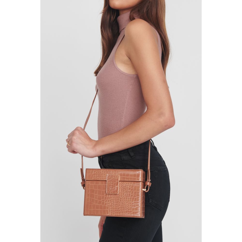 Woman wearing Tan Moda Luxe Jordyn Crossbody 842017128854 View 1 | Tan