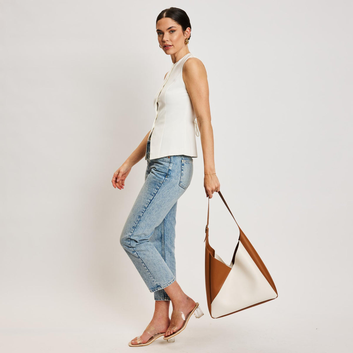 Woman wearing Ivory Tan Moda Luxe Frankie Hobo 842017138532 View 2 | Ivory Tan