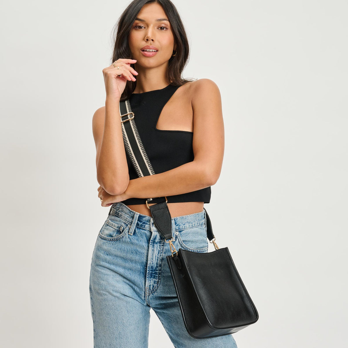 Woman wearing Black Moda Luxe Glitzia Crossbody 842017135135 View 2 | Black