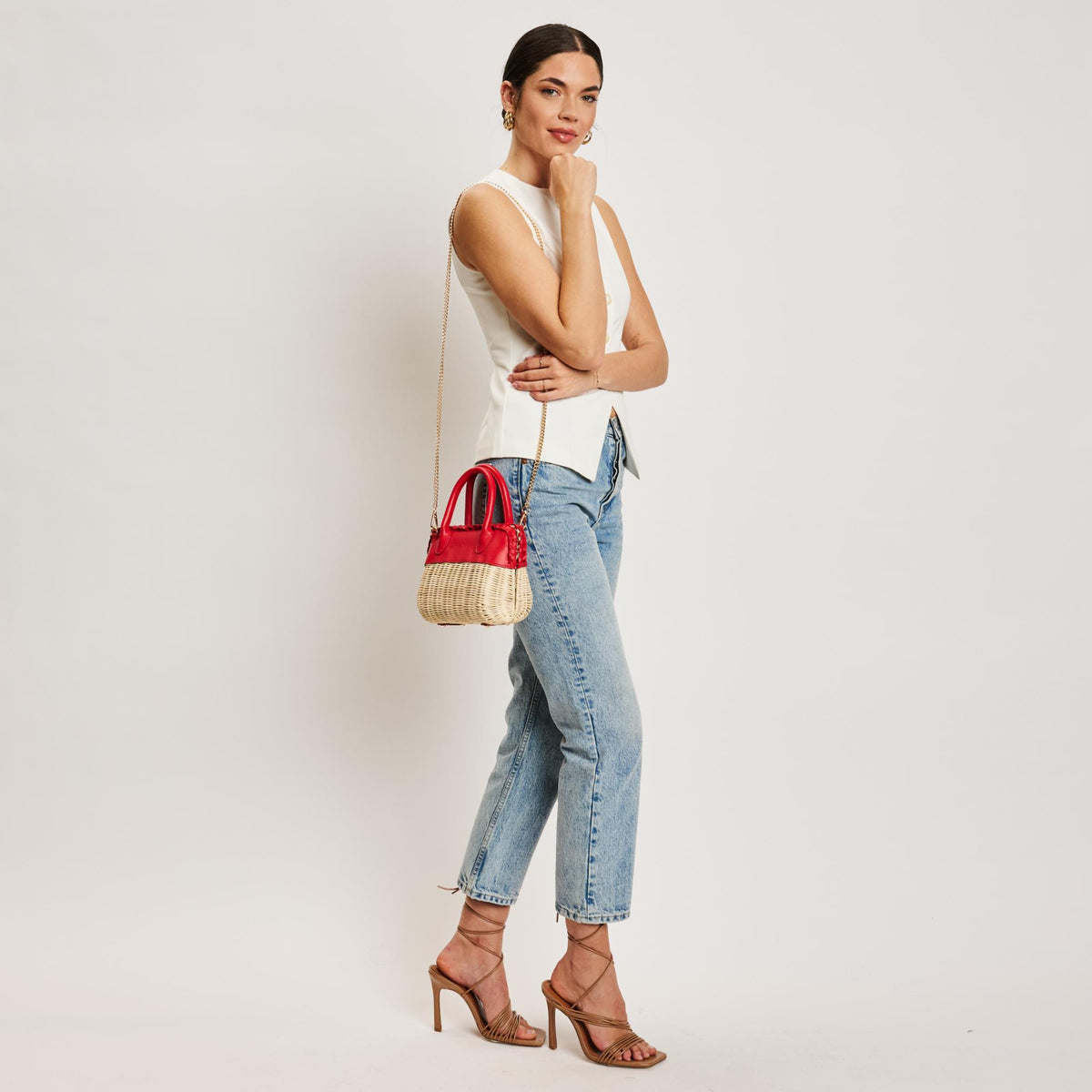 Woman wearing Red Moda Luxe Maya Crossbody 842017138327 View 3 | Red