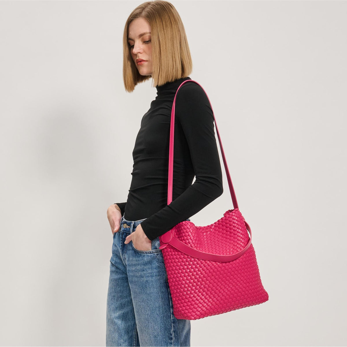 Woman wearing Fuchsia Moda Luxe Edith Hobo 842017137504 View 1 | Fuchsia