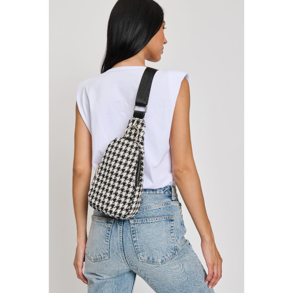 Woman wearing Black White Moda Luxe Regina Sling Backpack 842017133384 View 4 | Black White