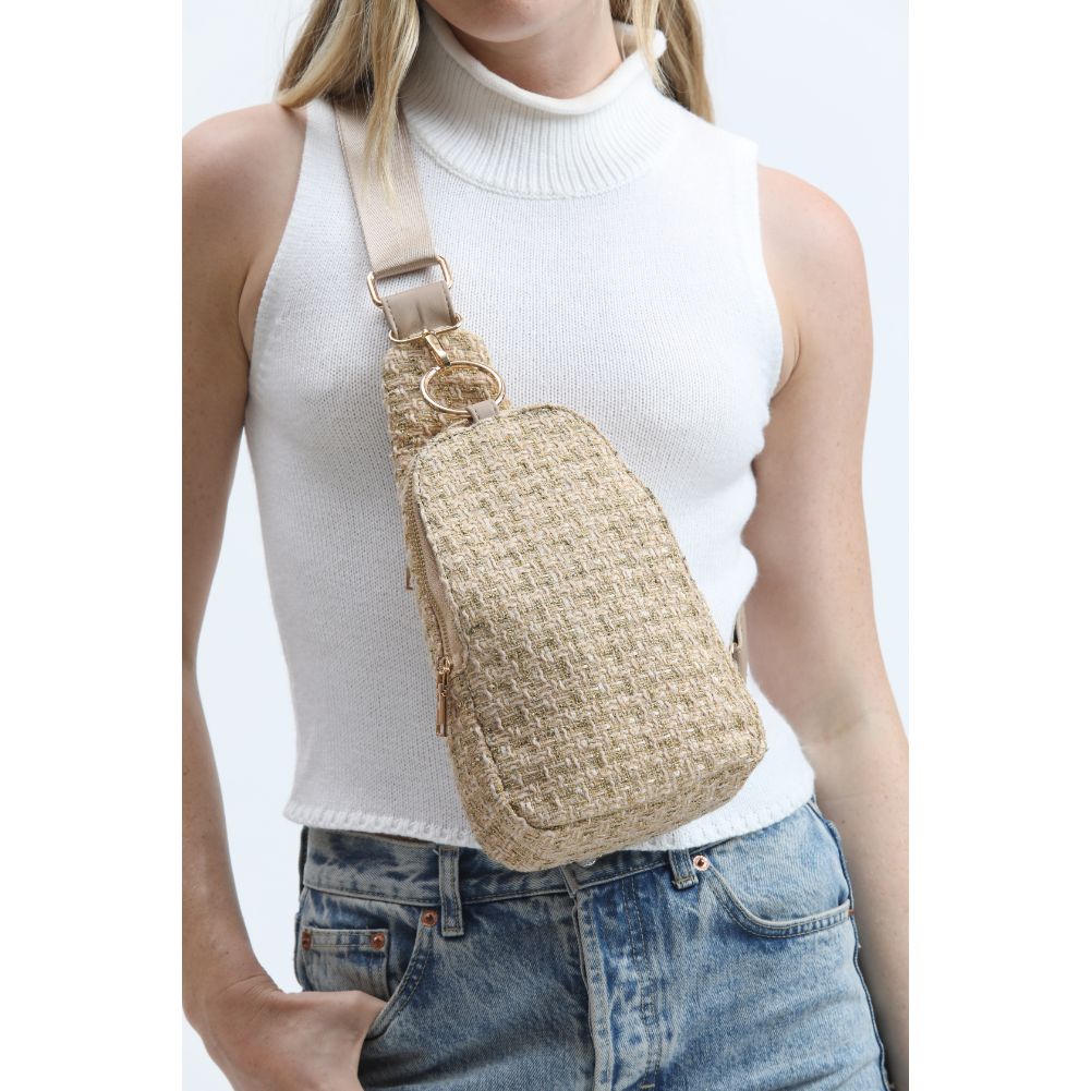 Woman wearing Natural Moda Luxe Regina Sling Backpack 842017133353 View 1 | Natural