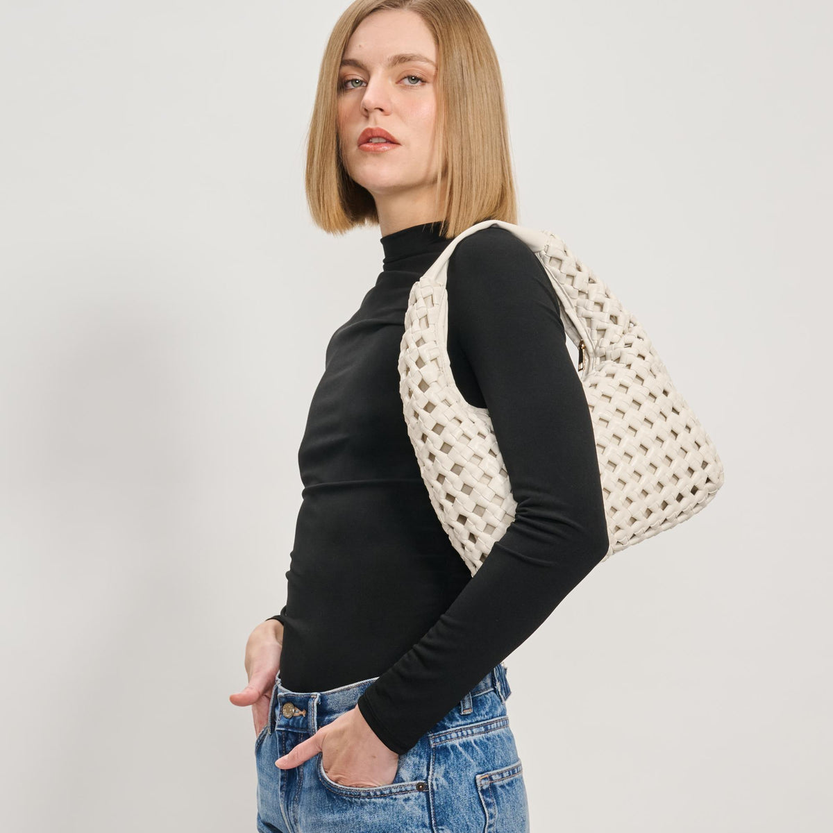 Woman wearing Oatmilk Moda Luxe Richelle Hobo 842017137528 View 2 | Oatmilk