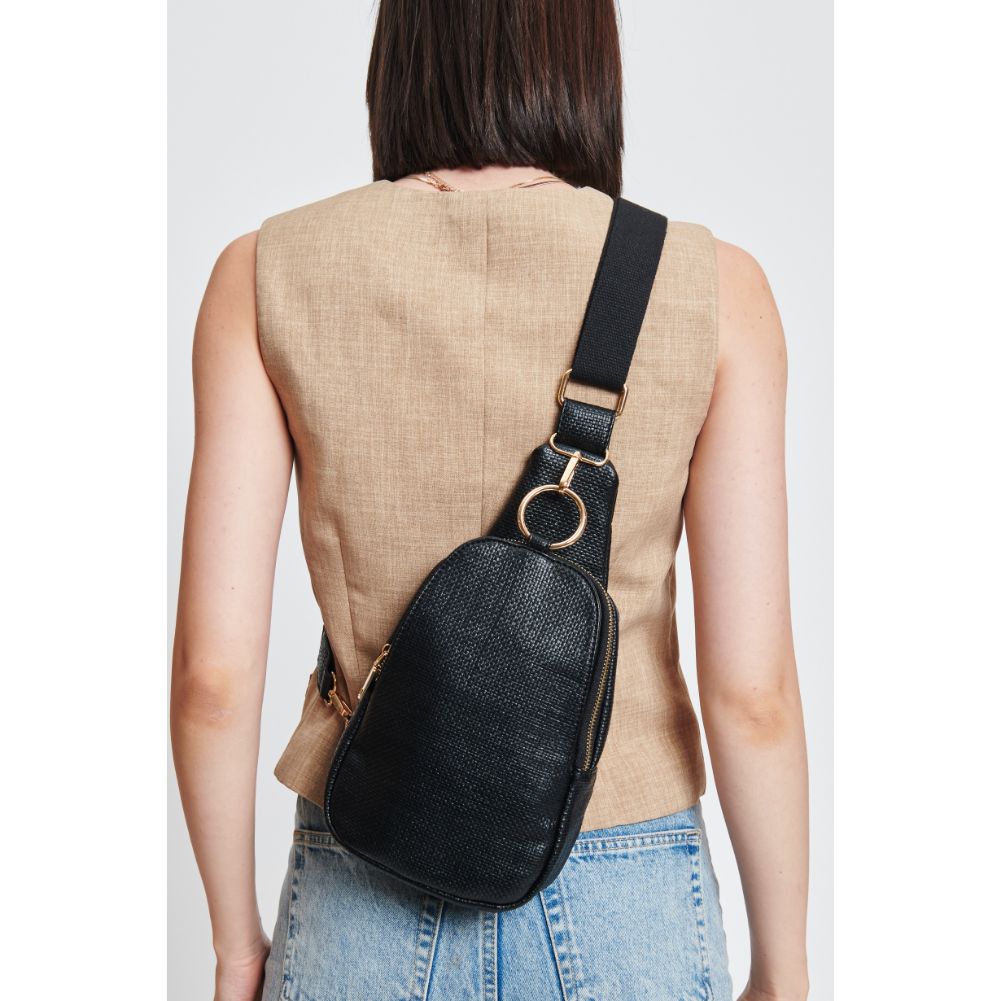 Woman wearing Black Moda Luxe Regina - Coated Canvas Sling Backpack 842017132592 View 4 | Black