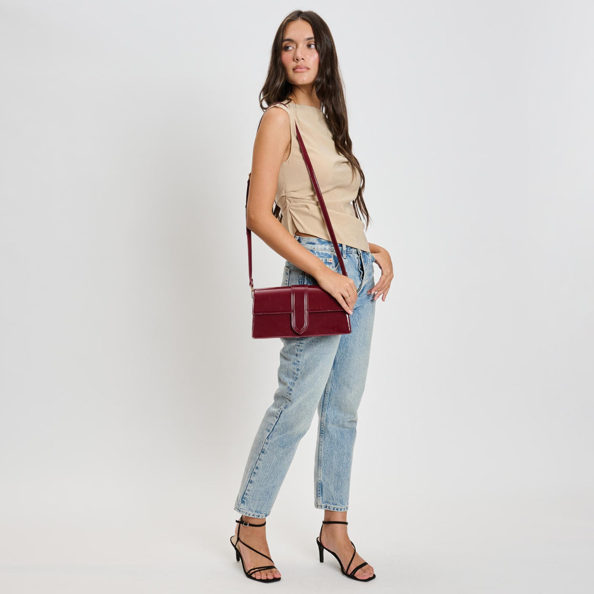 Woman wearing Burgundy Moda Luxe Violet - Patent Crossbody 842017136620 View 4 | Burgundy