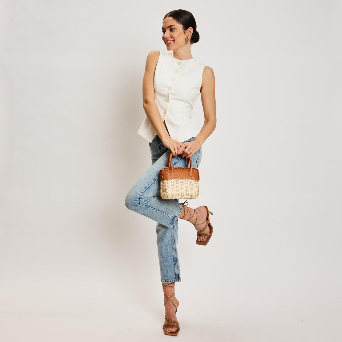 Woman wearing Tan Moda Luxe Maya Crossbody 842017138310 View 4 | Tan