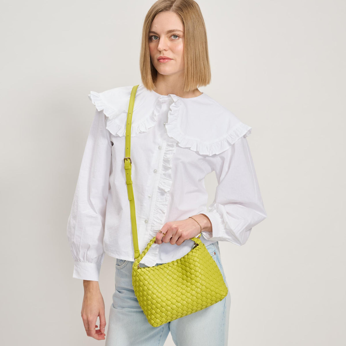 Woman wearing Lemon Moda Luxe Kaia Crossbody 842017137412 View 1 | Lemon