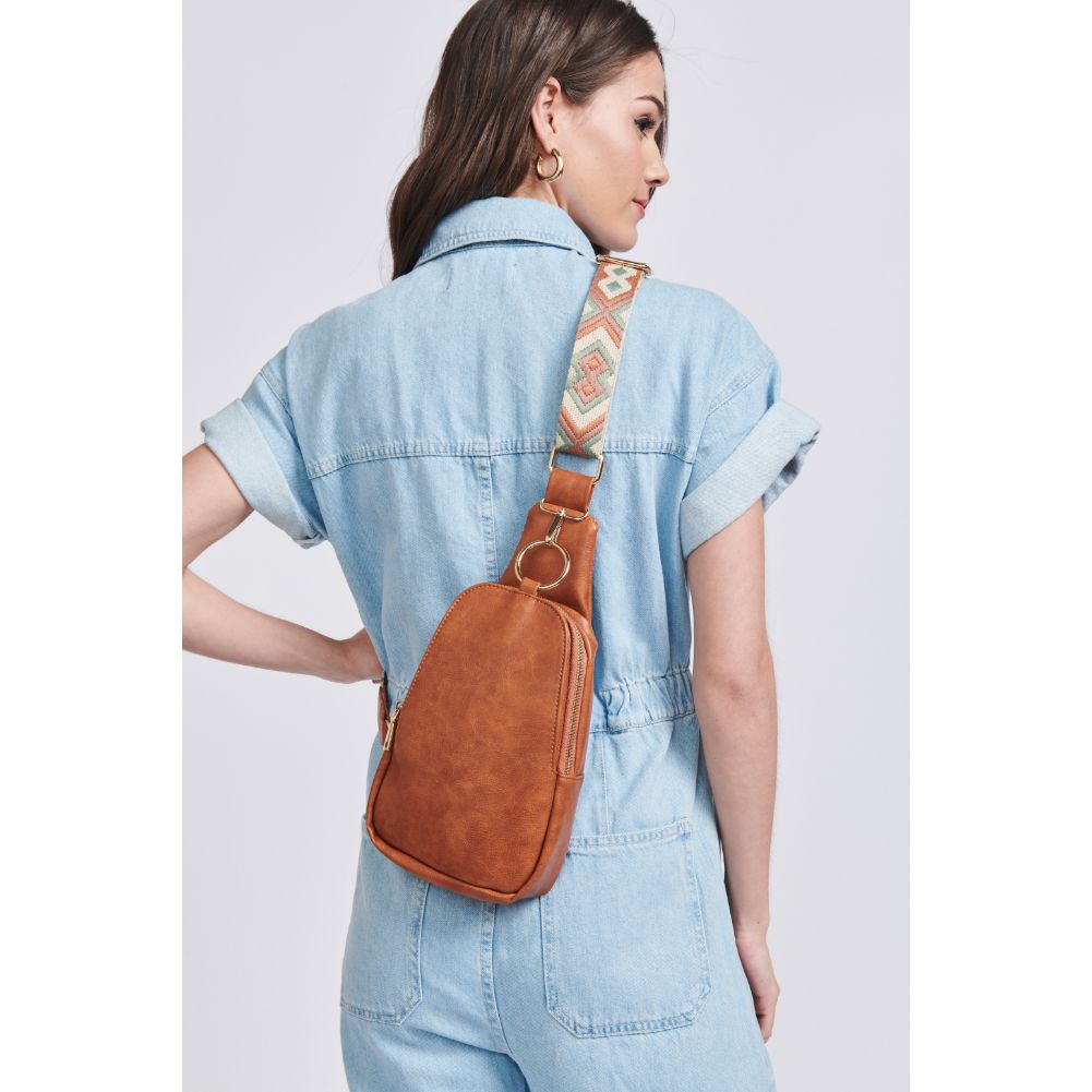 Woman wearing Tan Moda Luxe Regina Sling Backpack 842017129547 View 4 | Tan