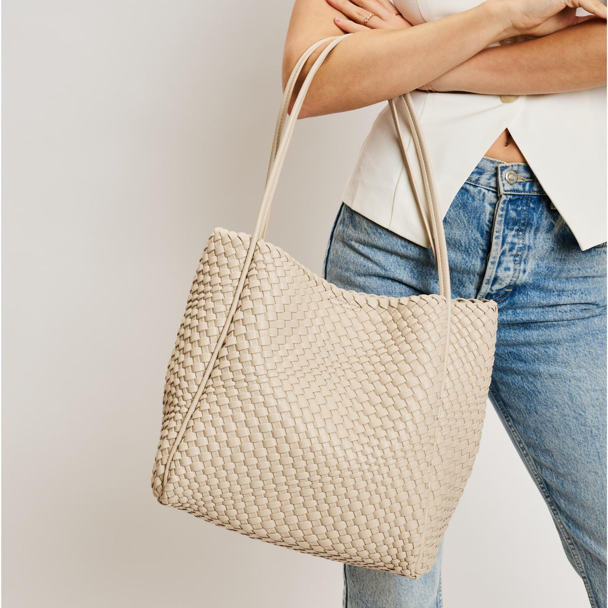 Woman wearing Ivory Moda Luxe Gladys Tote 842017137252 View 1 | Ivory