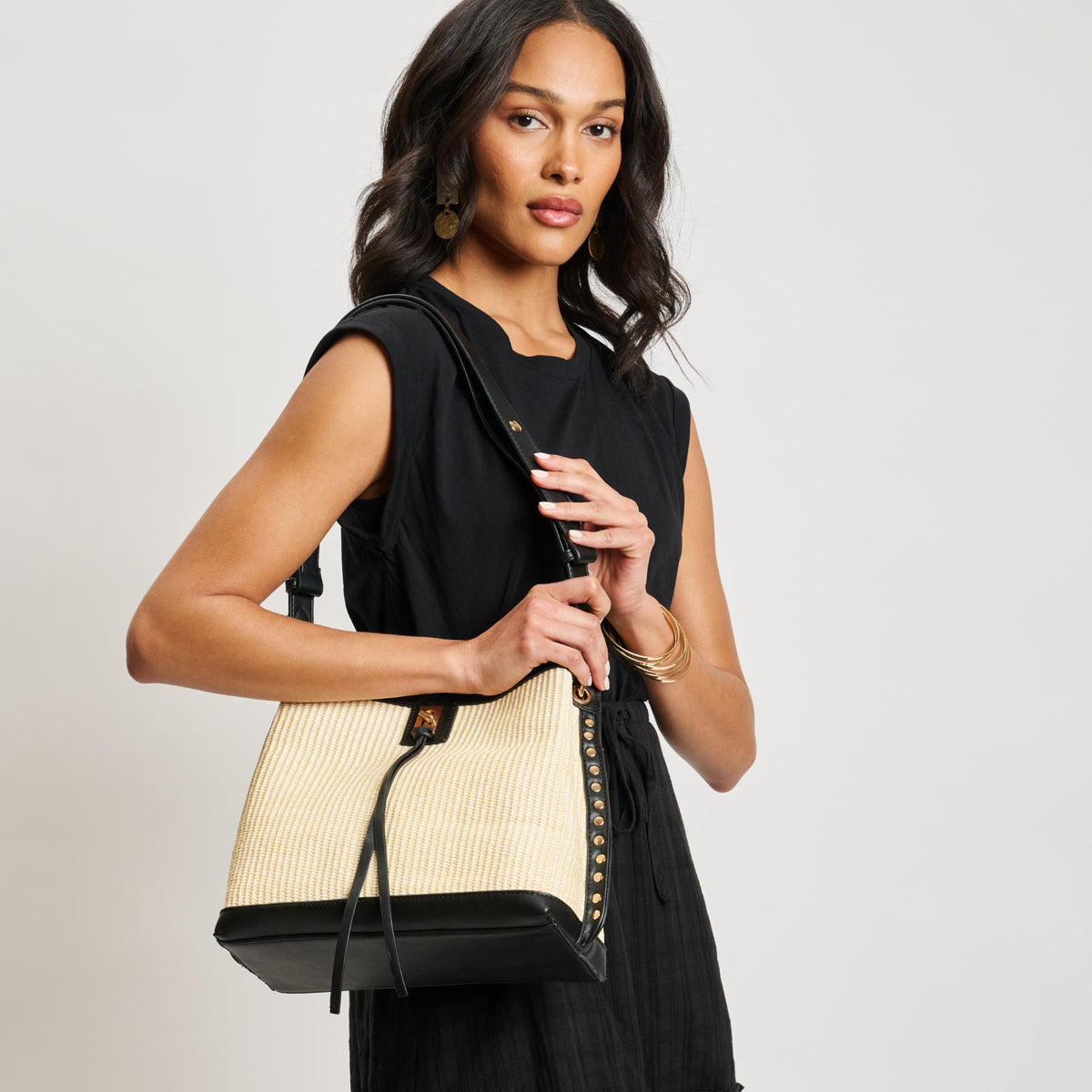 Woman wearing Ivory Black Moda Luxe Rina Shoulder Bag 842017138150 View 2 | Ivory Black