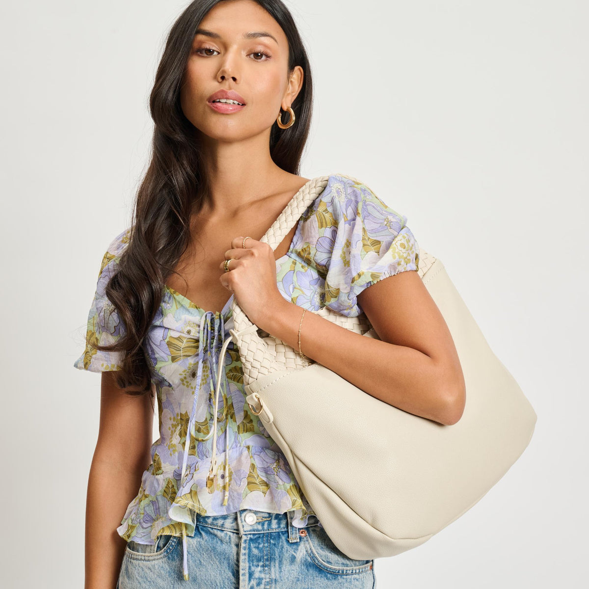 Woman wearing Ivory Moda Luxe Majestique Hobo 842017134671 View 1 | Ivory