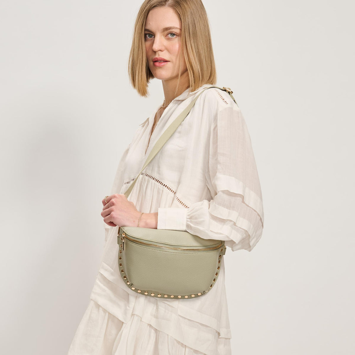 Woman wearing Sage Moda Luxe Gizelle Belt Bag 842017138051 View 1 | Sage