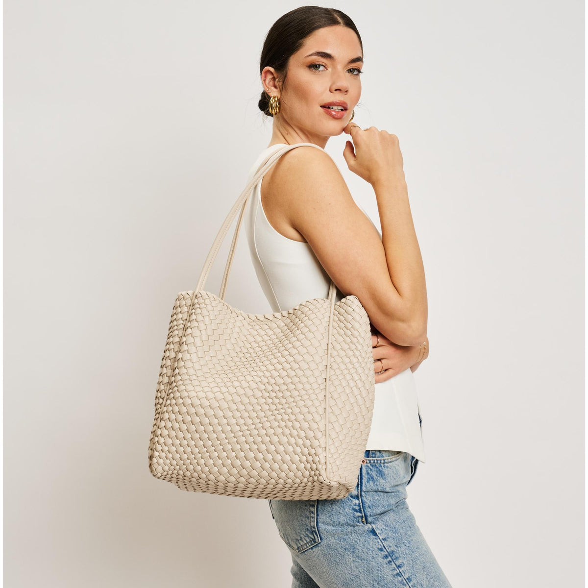 Woman wearing Ivory Moda Luxe Gladys Tote 842017137252 View 2 | Ivory