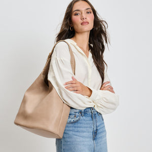 Woman wearing Natural Moda Luxe Jacqueline Hobo 842017136989 View 1 | Natural