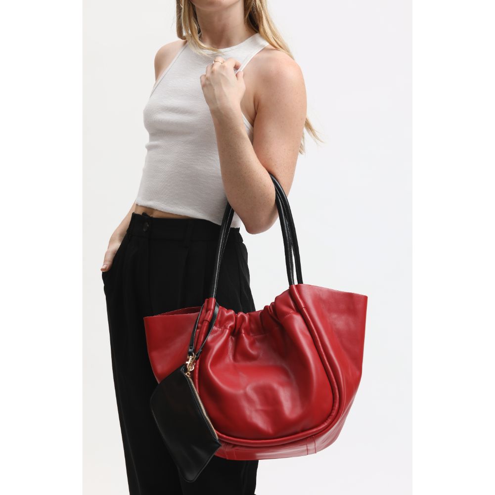Woman wearing Red Moda Luxe Aaliyah Tote 842017133193 View 1 | Red