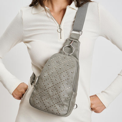 Woman wearing Grey Moda Luxe Regina Studded Sling Backpack 842017136811 View 1 | Grey