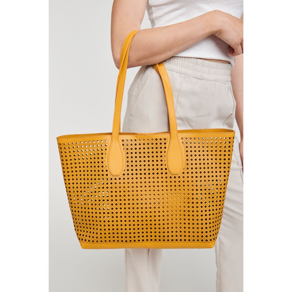 Woman wearing Mustard Moda Luxe Brazil Tote 842017124245 View 1 | Mustard