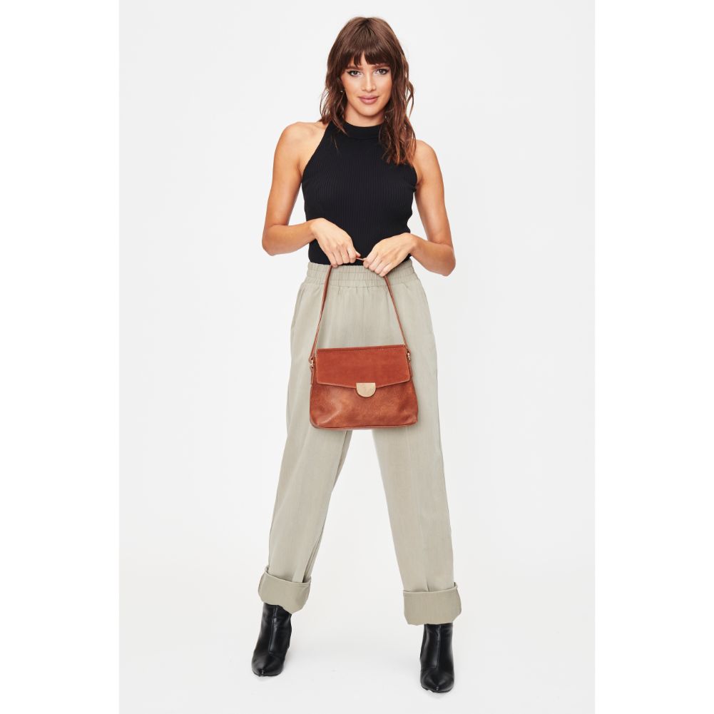 Woman wearing Cognac Moda Luxe Abby Crossbody 842017128625 View 4 | Cognac