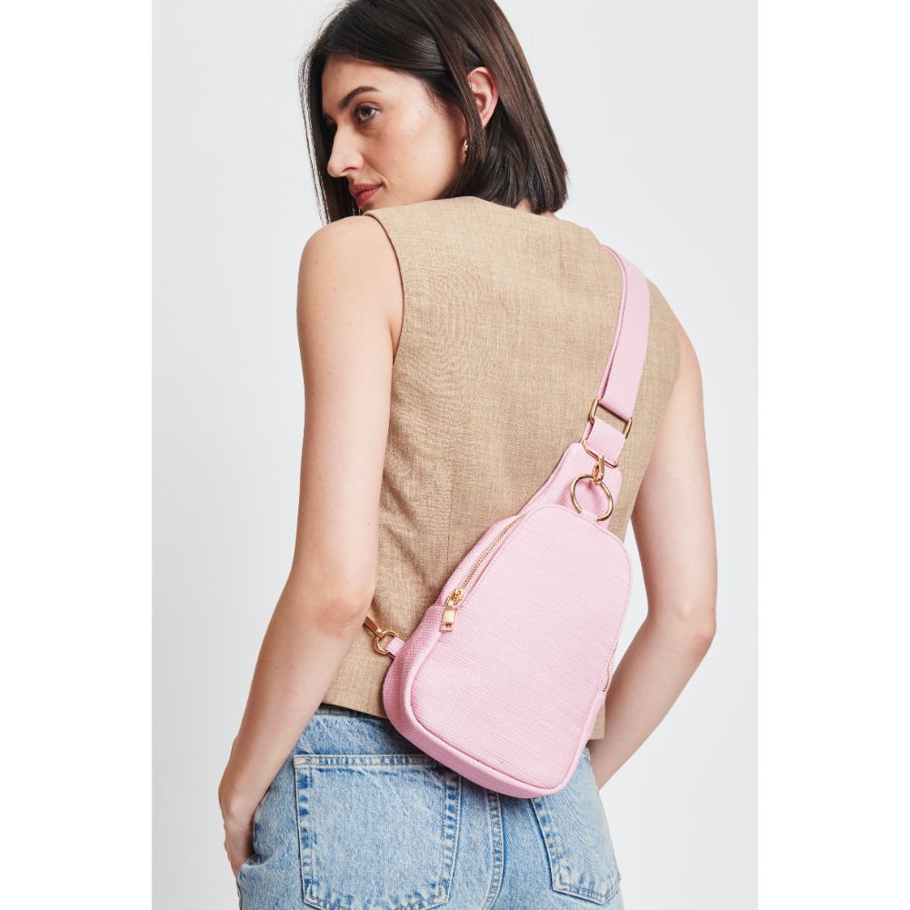 Woman wearing Bubblegum Moda Luxe Regina - Coated Canvas Sling Backpack 842017132639 View 1 | Bubblegum