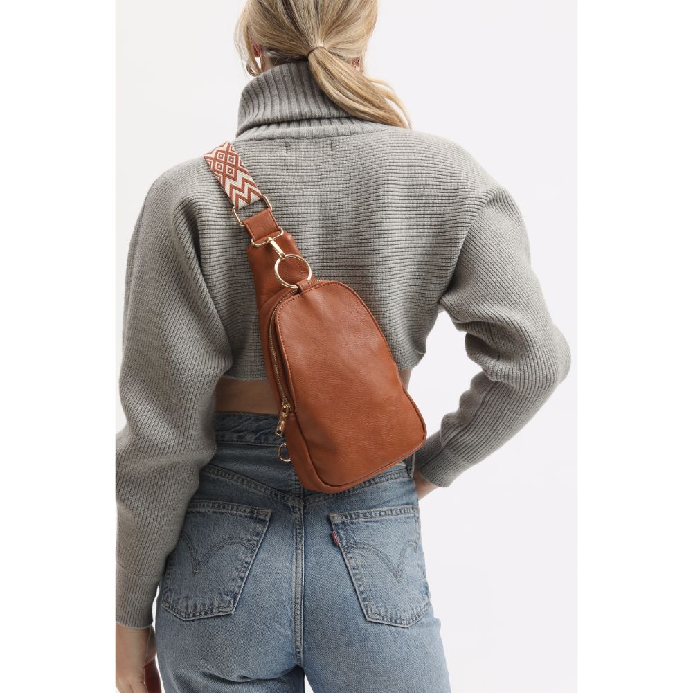 Woman wearing Tan Moda Luxe Regina Sling Backpack 842017133339 View 2 | Tan