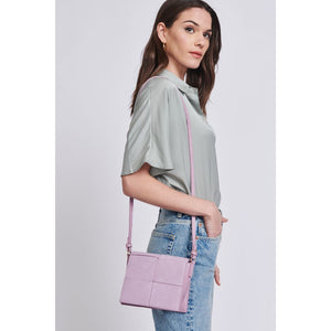 Woman wearing Lilac Moda Luxe Lena Crossbody 842017129462 View 3 | Lilac